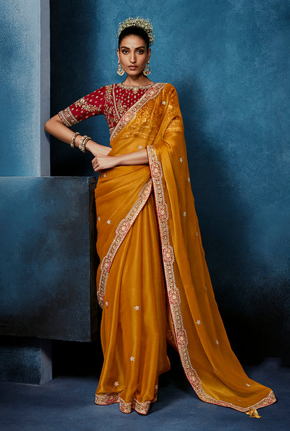 Monjolika Fashion Orange Fancy Fabric Embroidered Saree With Stitched Blouse