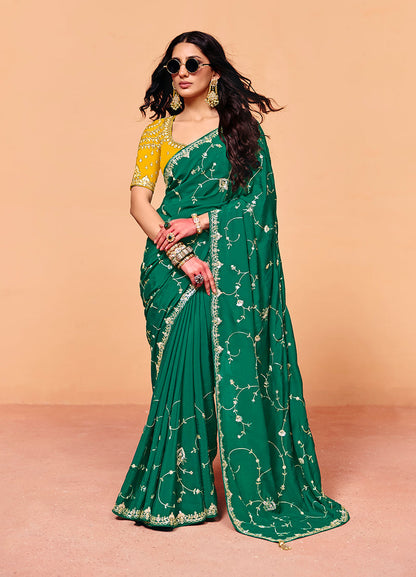 Monjolika Fashion Teal Green Faux Organza Satin Saree With Embroidery