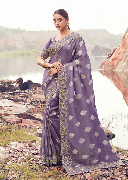 Monjolika Fashion Lavender Purple Embroidered Woven Faux Tissue Silk Saree