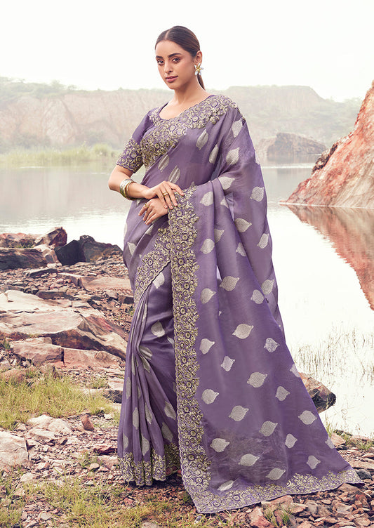 Monjolika Fashion Lavender Purple Embroidered Woven Faux Tissue Silk Saree
