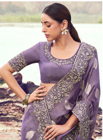 Monjolika Fashion Lavender Purple Embroidered Woven Faux Tissue Silk Saree