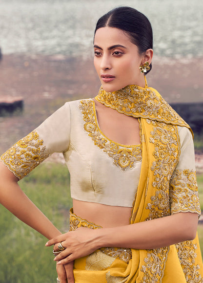 Monjolika Fashion Yellow Embroidered Woven Faux Tissue Silk Saree