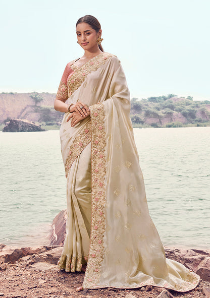 Monjolika Fashion Off White Embroidered Satin Silk Saree
