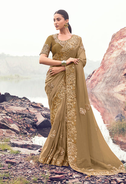 Monjolika Fashion Chiku Embroidered Banarasi Silk Blend Saree