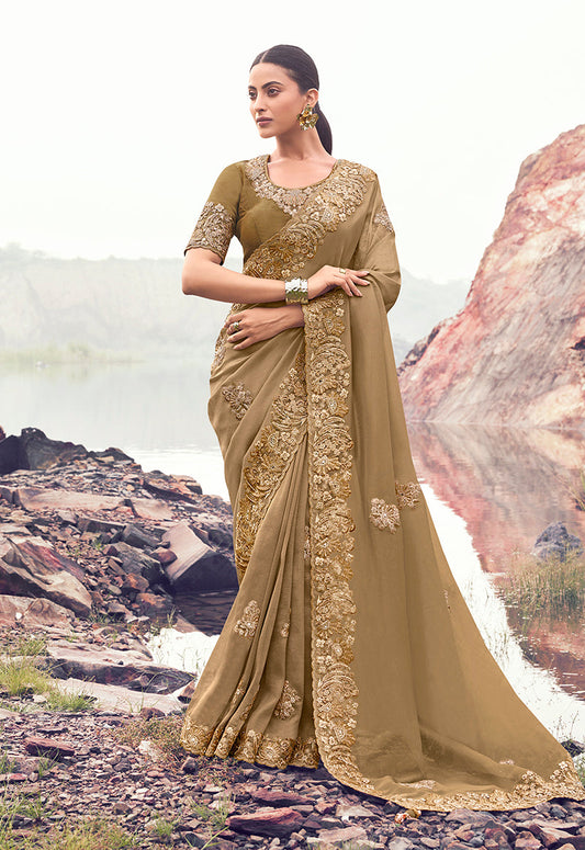 Monjolika Fashion Chiku Embroidered Banarasi Silk Blend Saree