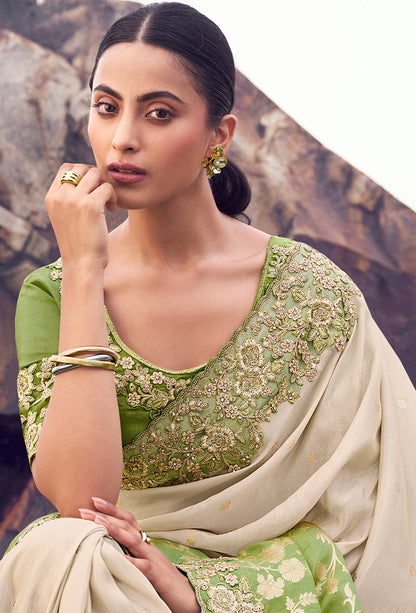 Monjolika Fashion Beige & Green Embroidered Woven Faux Tissue Silk Saree