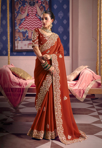 Monjolika Fashion Rust Viscose Zari Tissue Silk Embroidered Saree