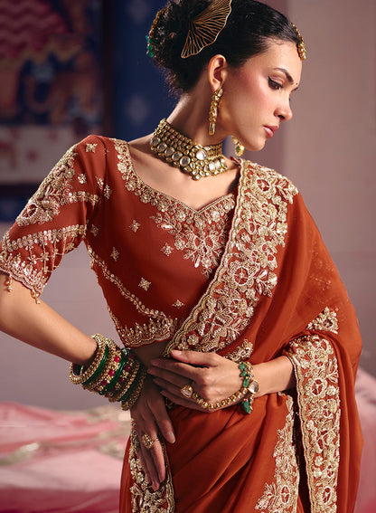 Monjolika Fashion Rust Viscose Zari Tissue Silk Embroidered Saree