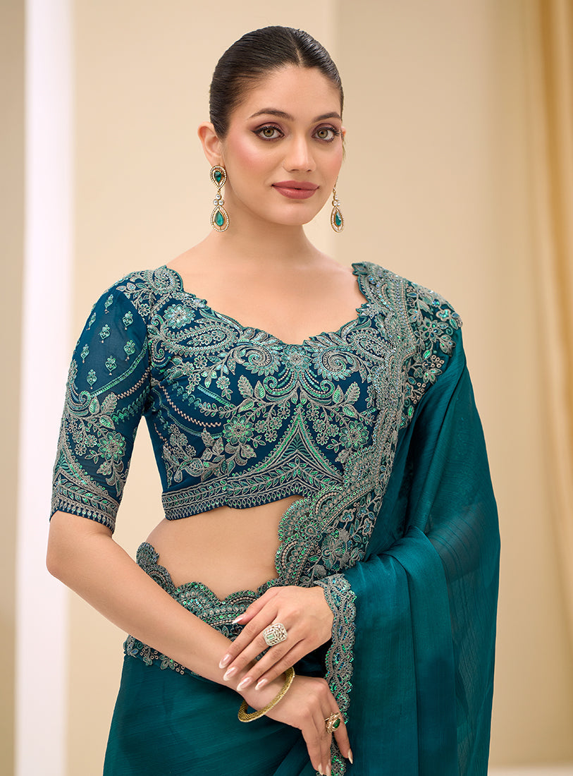 Monjolika Fashion Teal Faux Chiffon Satin Patch Border and Embroidered Work Saree