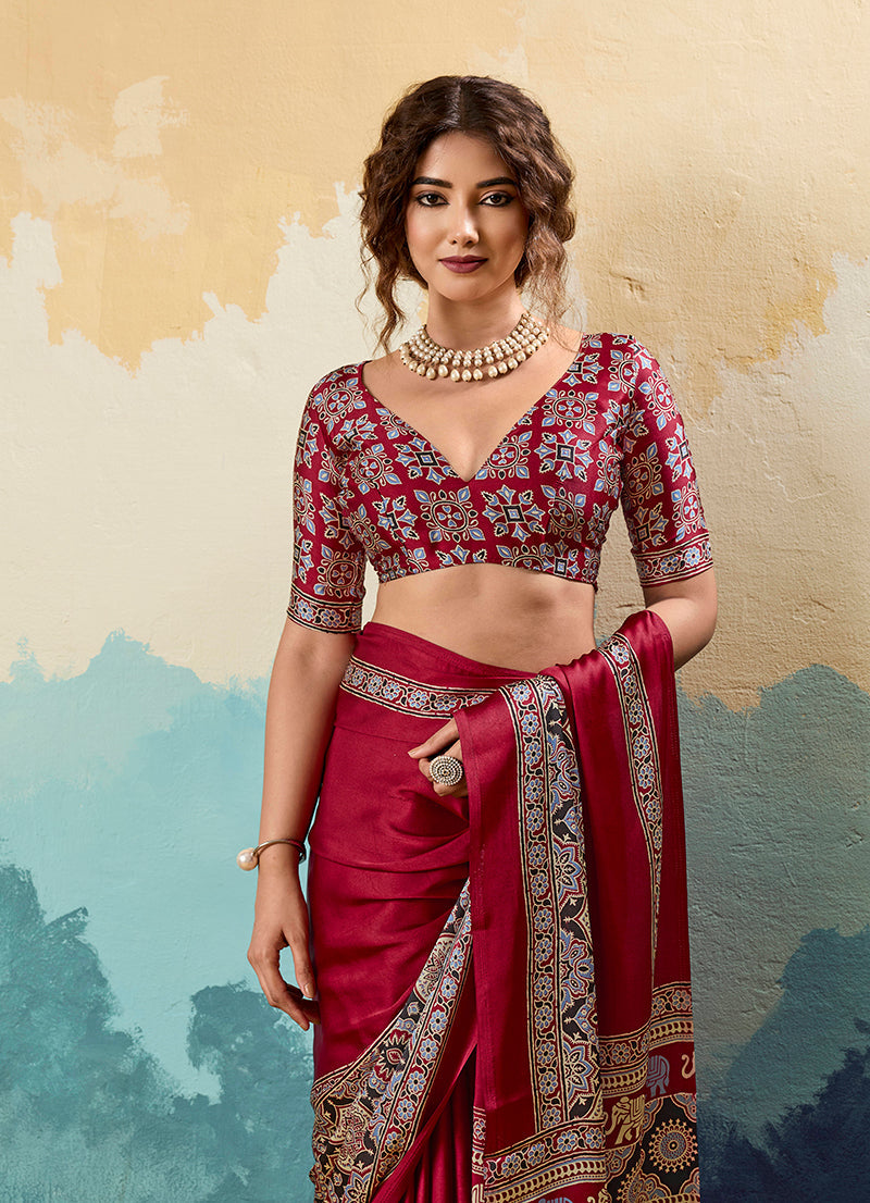 Monjolika Fashion Ajrakh Red Faux Satin Printed Saree With Ethnic Motif