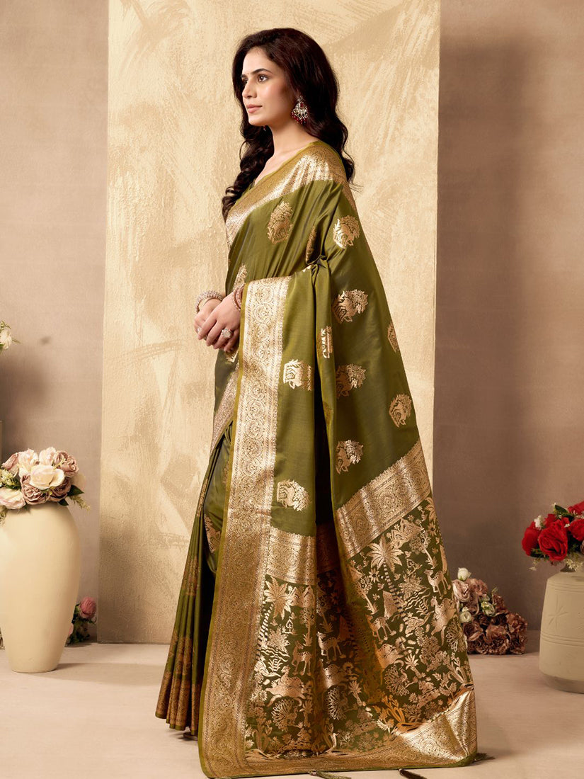 Monjolika Fashion Mehendi Green Banarasi Silk Blend Zari Weaving Saree With Blouse Piece