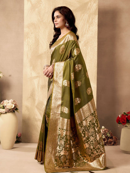 Monjolika Fashion Mehendi Green Banarasi Silk Blend Zari Weaving Saree With Blouse Piece
