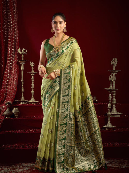 Monjolika Fashion Light Green Soft Banarasi Silk Blend Zari Woven Saree With Blouse Piece