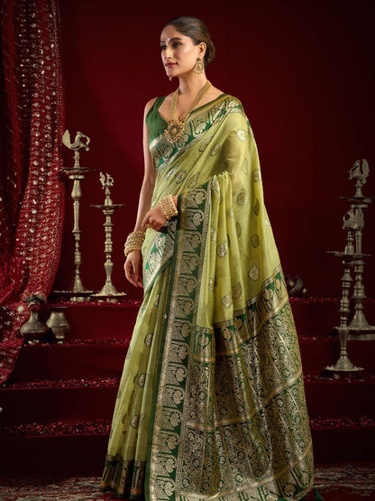 Monjolika Fashion Light Green Soft Banarasi Silk Blend Zari Woven Saree With Blouse Piece