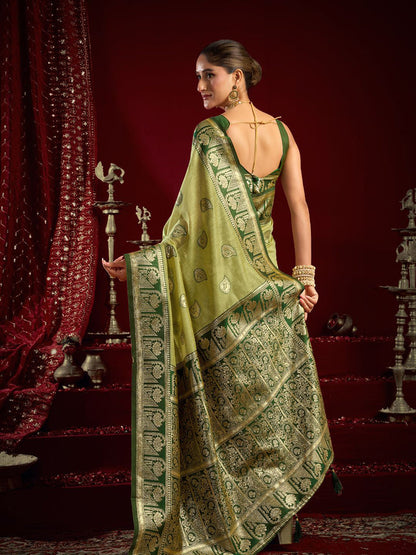 Monjolika Fashion Light Green Soft Banarasi Silk Blend Zari Woven Saree With Blouse Piece