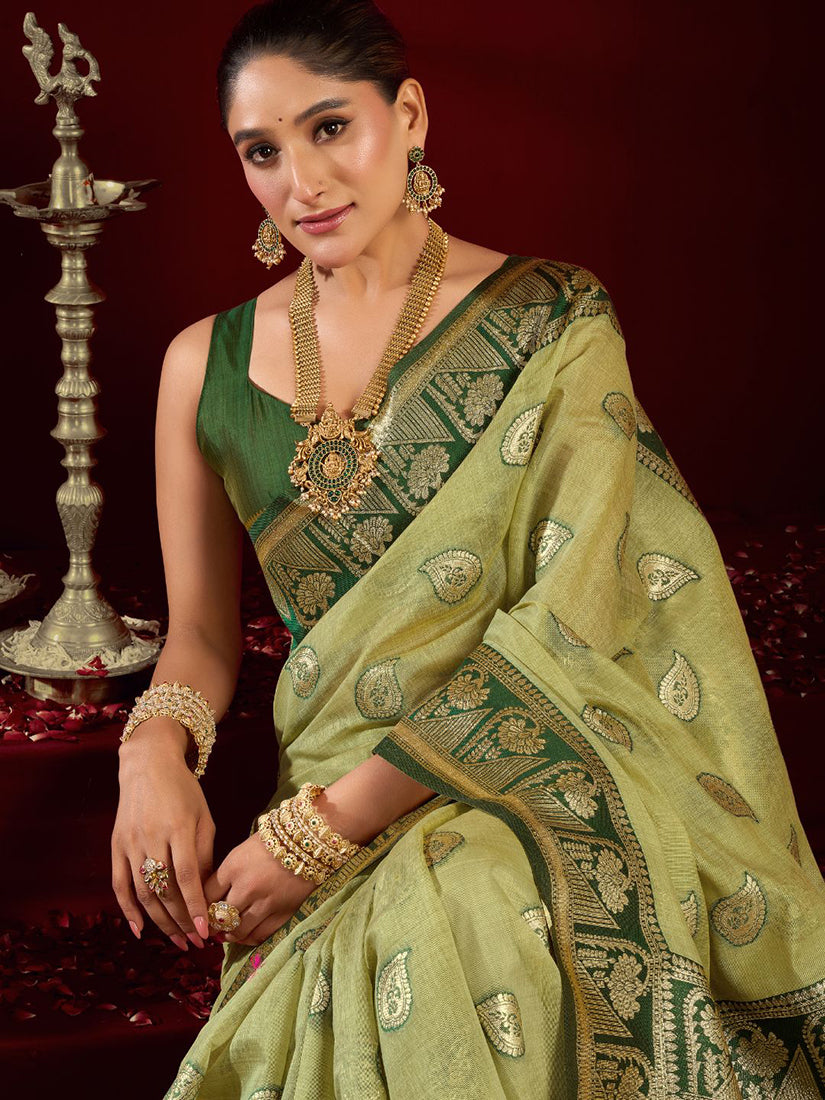 Monjolika Fashion Light Green Soft Banarasi Silk Blend Zari Woven Saree With Blouse Piece