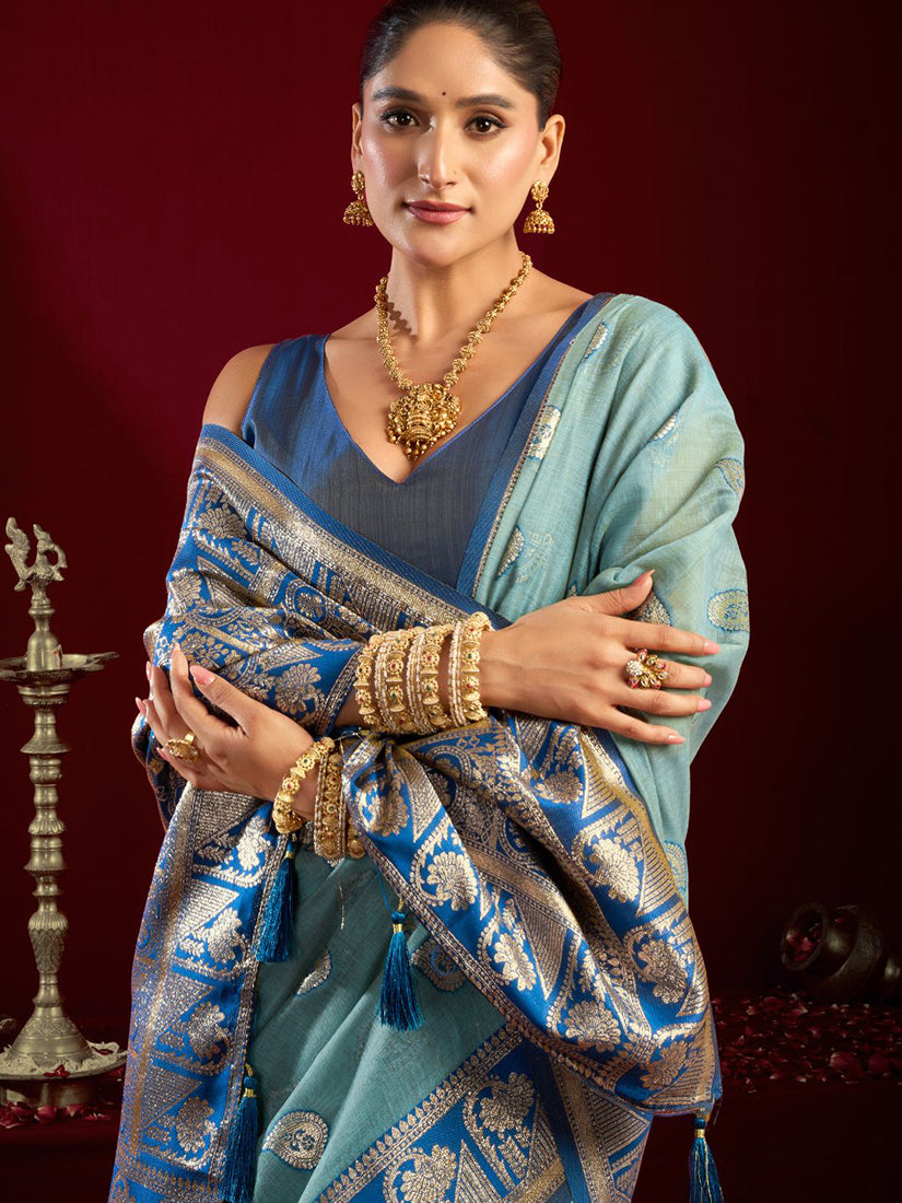 Monjolika Fashion Light Blue Soft Banarasi Silk Blend Zari Woven Saree With Blouse Piece