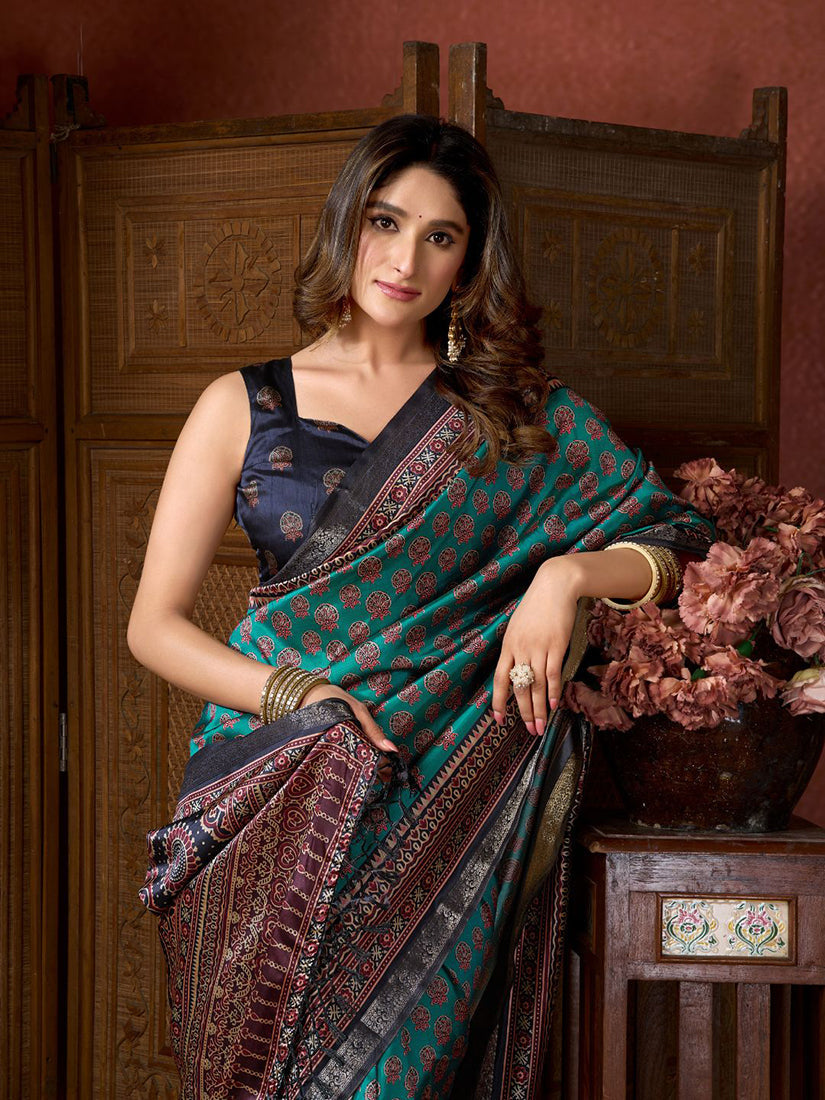Monjolika Fashion Teal Faux Crepe Silk Printed Saree with Blouse Piece