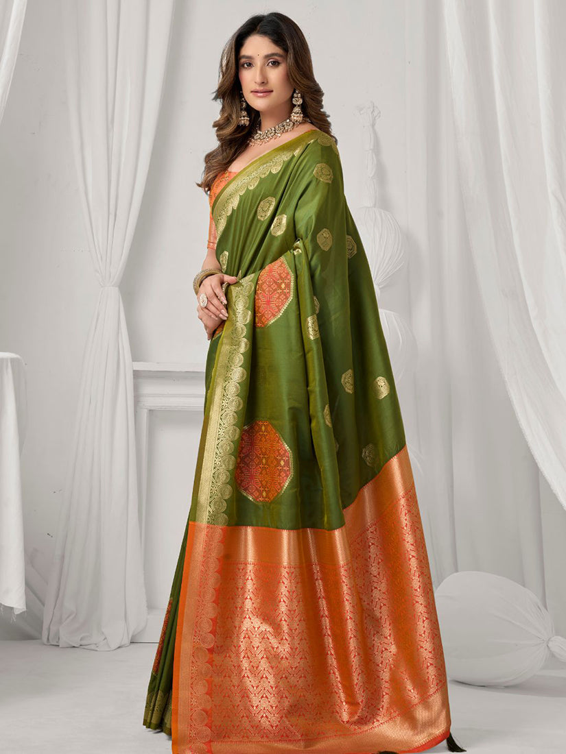 Monjolika Fashion Mehendi Green Soft Banarasi Silk Blend Zari Woven Saree with Blouse Piece