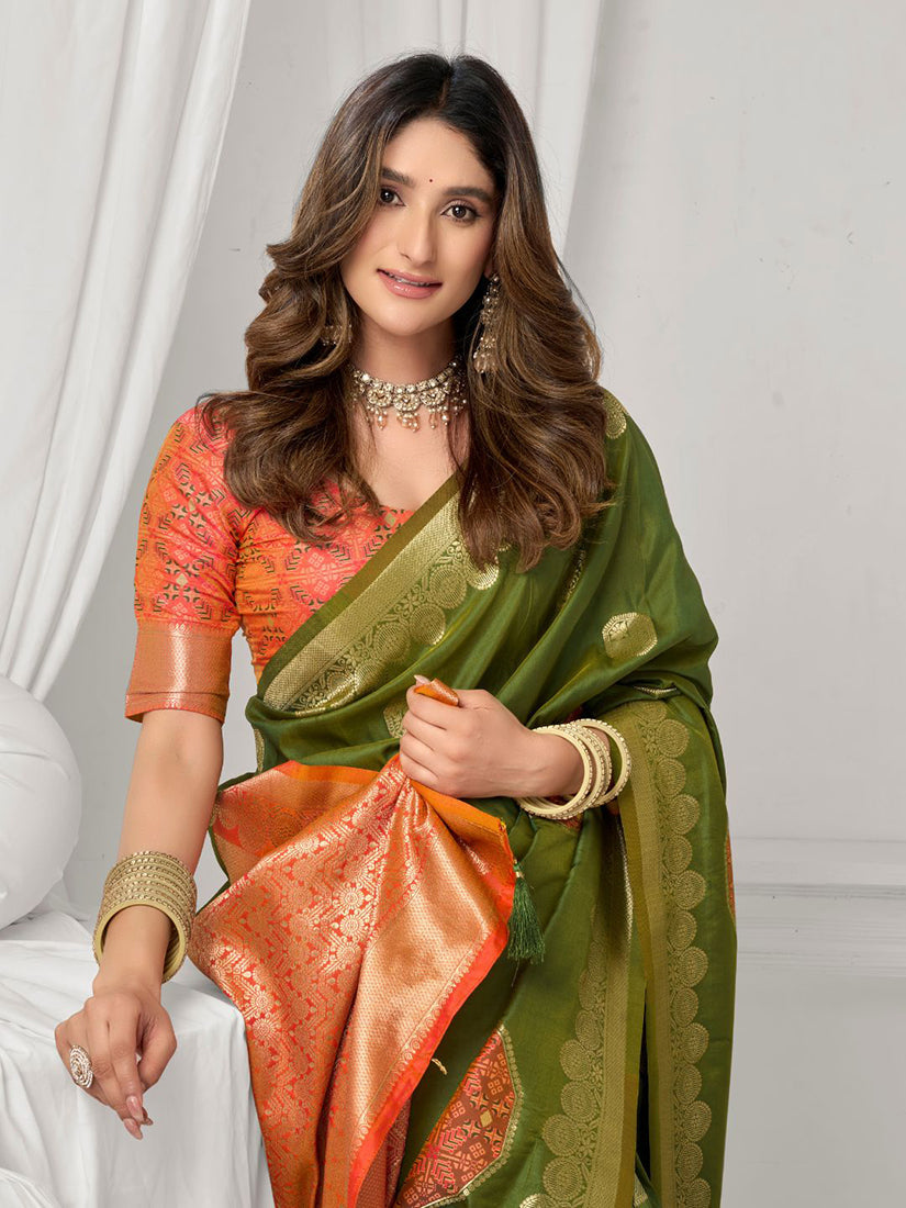 Monjolika Fashion Mehendi Green Soft Banarasi Silk Blend Zari Woven Saree with Blouse Piece