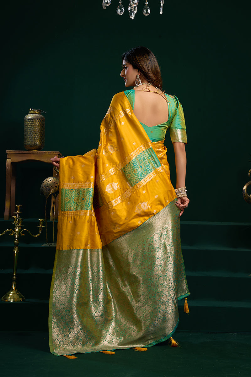 Monjolika Fashion Mustard Soft Banarasi Silk Blend Zari Weaving Saree With Blouse Piece