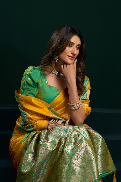 Monjolika Fashion Mustard Soft Banarasi Silk Blend Zari Weaving Saree With Blouse Piece