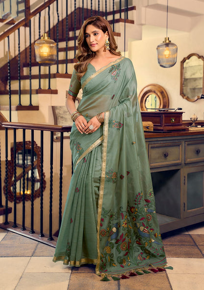 Monjolika Fashion Sage Green Cotton Blend Saree With Litchi Work & Tassels