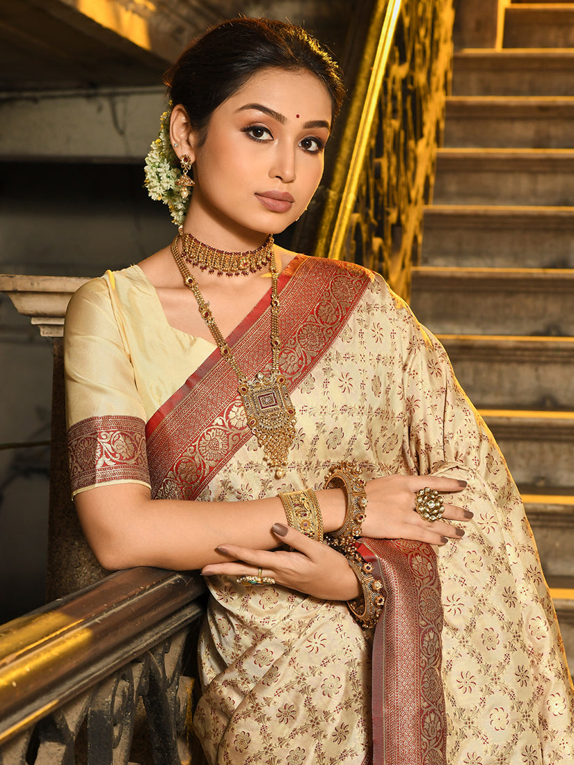 Monjolika Fashion Cream Banarasi Silk Blend Saree with Red Zari Border