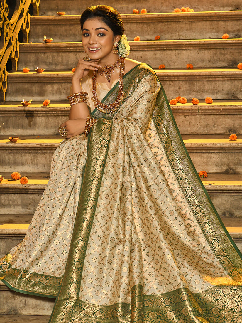 Monjolika Fashion Cream Banarasi Silk Blend Saree with Dark Green Zari Border