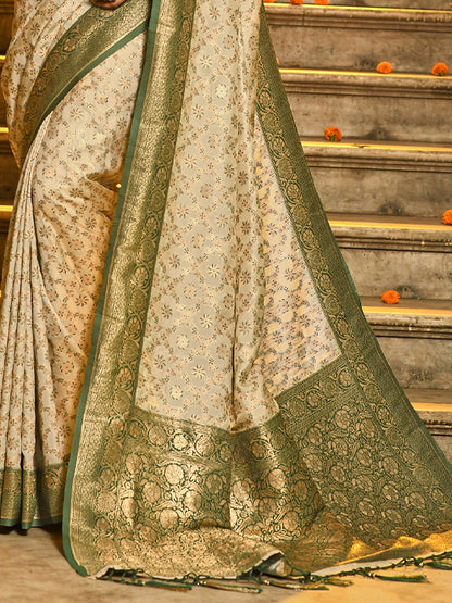 Monjolika Fashion Cream Banarasi Silk Blend Saree with Dark Green Zari Border