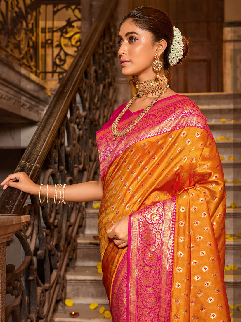 Monjolika Fashion Orange Banarasi Silk Blend Saree with Magenta Zari Border