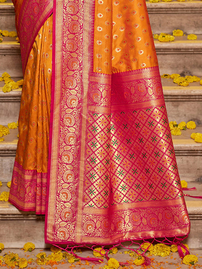 Monjolika Fashion Orange Banarasi Silk Blend Saree with Magenta Zari Border