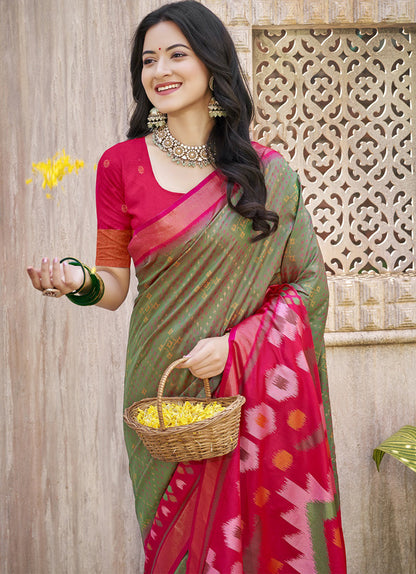 Monjolika Fashion Olive Green & Pink Silk Blend Woven Design Saree with Blouse Piece