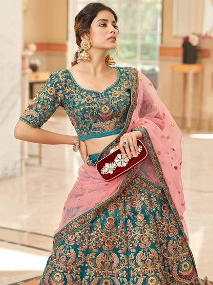 Tulsi Art Ravishing Teal Blue Heavy Embroidered Velvet Bridesmaid Lehenga Choli