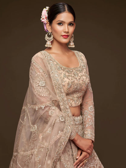 Tulsi Art Ravishing Beige Embroidered Soft Net Ceremony Wear Lehenga Choli