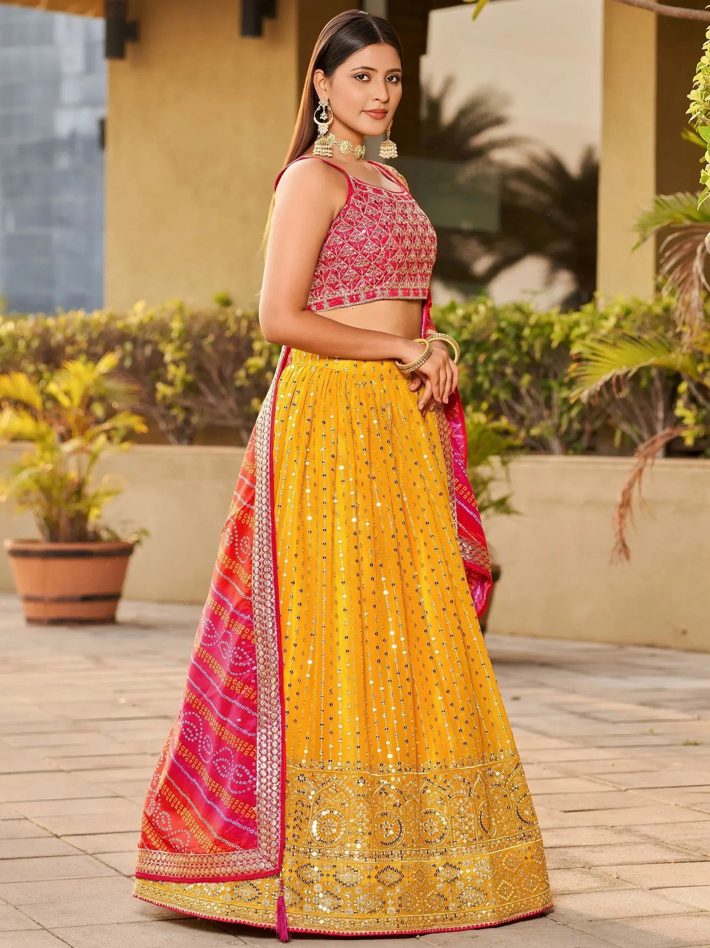 Tulsi Art Stunning Yellow Sequins Georgette Wedding Wear Lehenga Choli