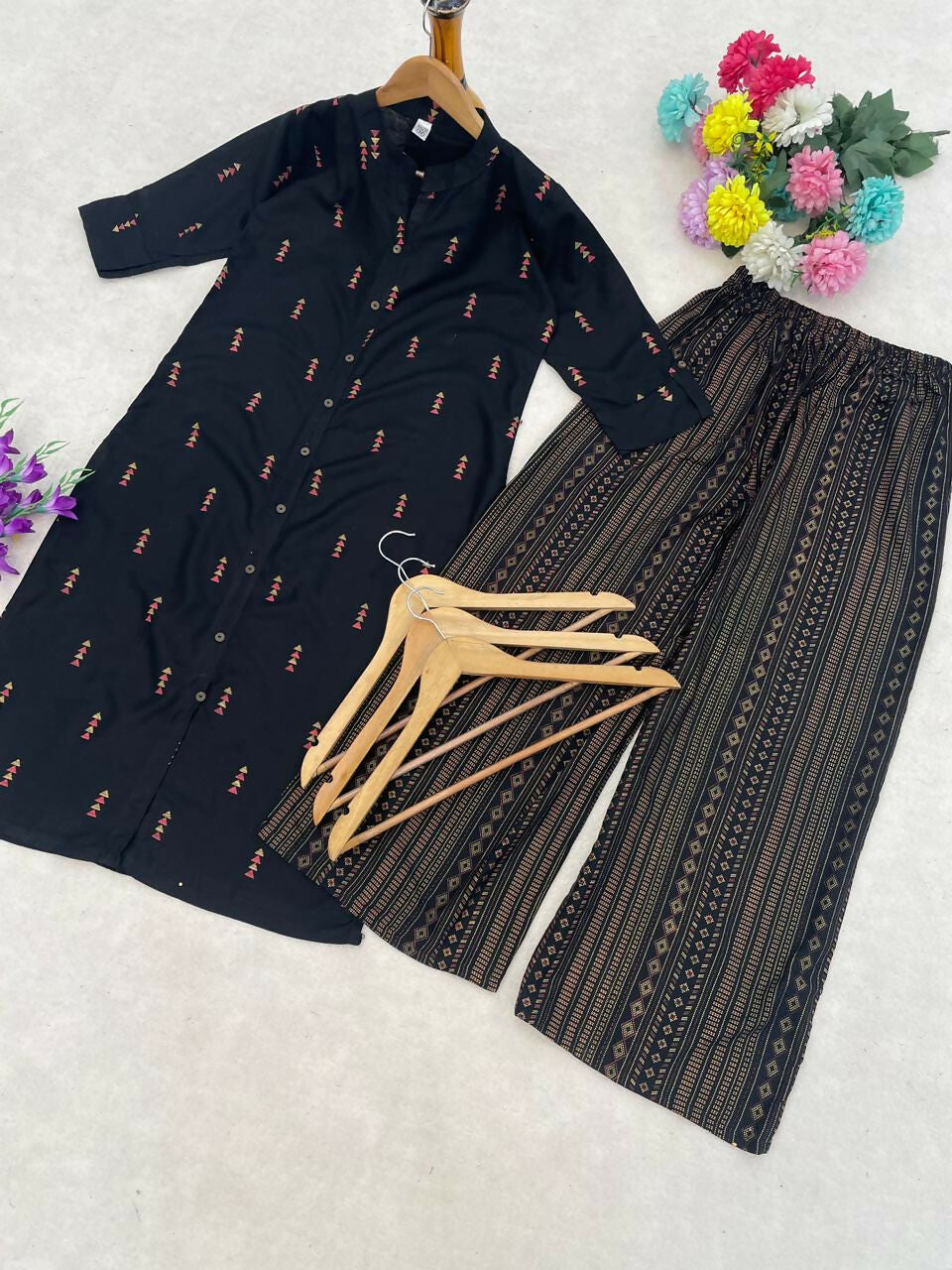 Teeya Creation Classic Black Cotton Kurta Set With Subtle Embroidery And Printed Palazzos