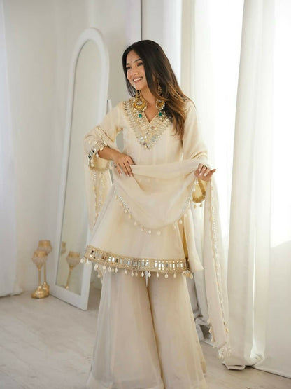 Teeya Creation New Latest Trendy Real Mirror Work With Lace Border Cream Kurta Set