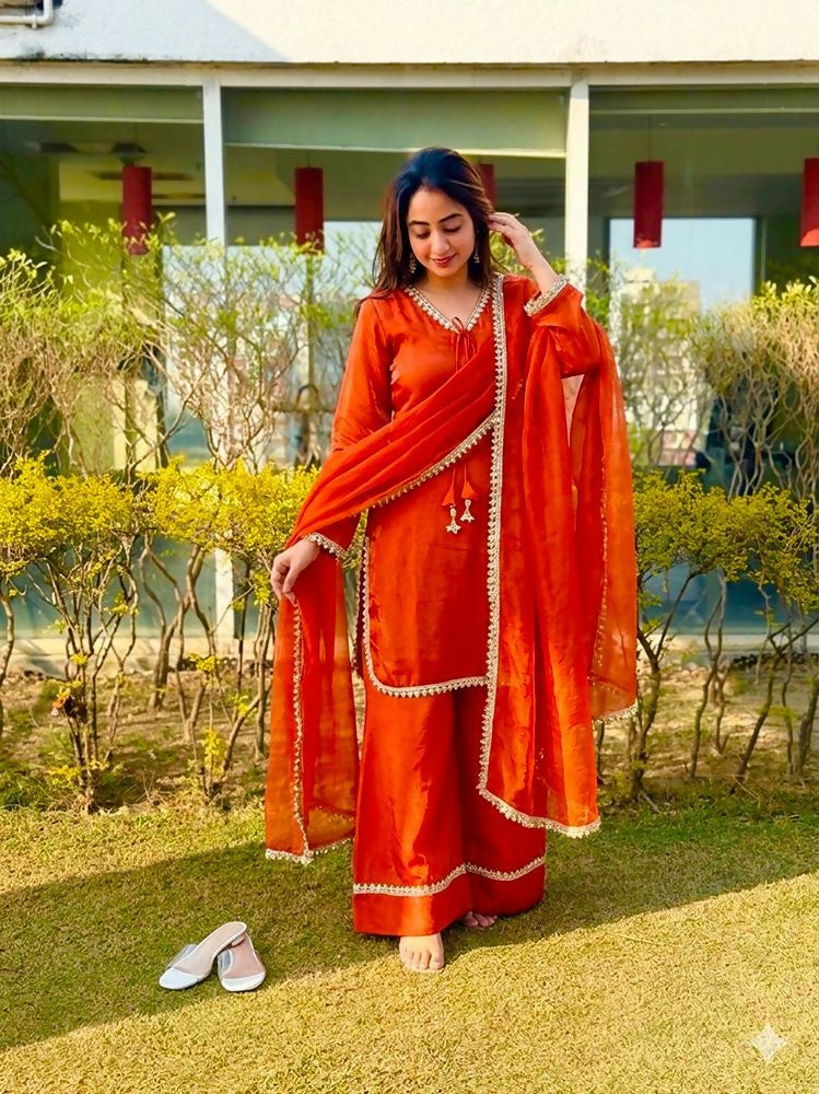 Teeya Creation New Trendy Elegant Orange Chanderi Silk Kurta Set with Delicate Lace Detailing and Matching Dupatta