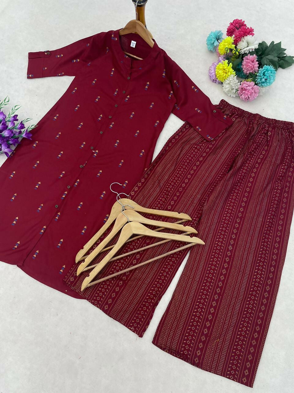 Teeya Creation Elegant Red Cotton Kurta Set Featuring Button Detail And Printed Palazzos