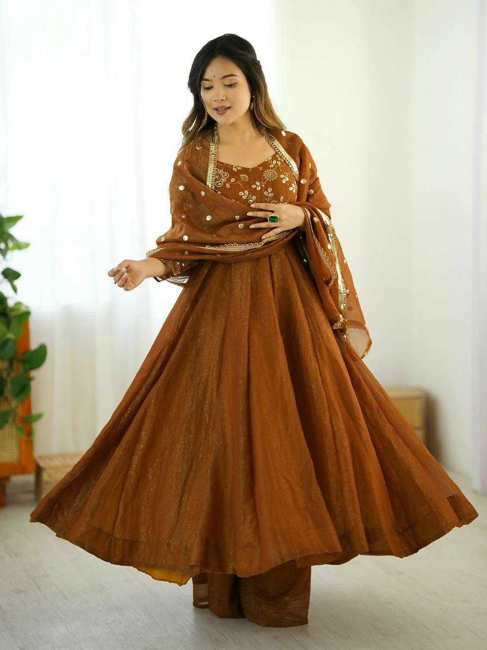 Teeya Creation New Trendy Stylish Elegant Finish With Full Flair Gold Gown Set