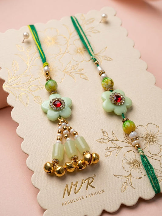 NVR Set of 2 Flower Shape Artificial Stones & Beads Bhaiya Bhabhi Rakhi With Roli Chawal