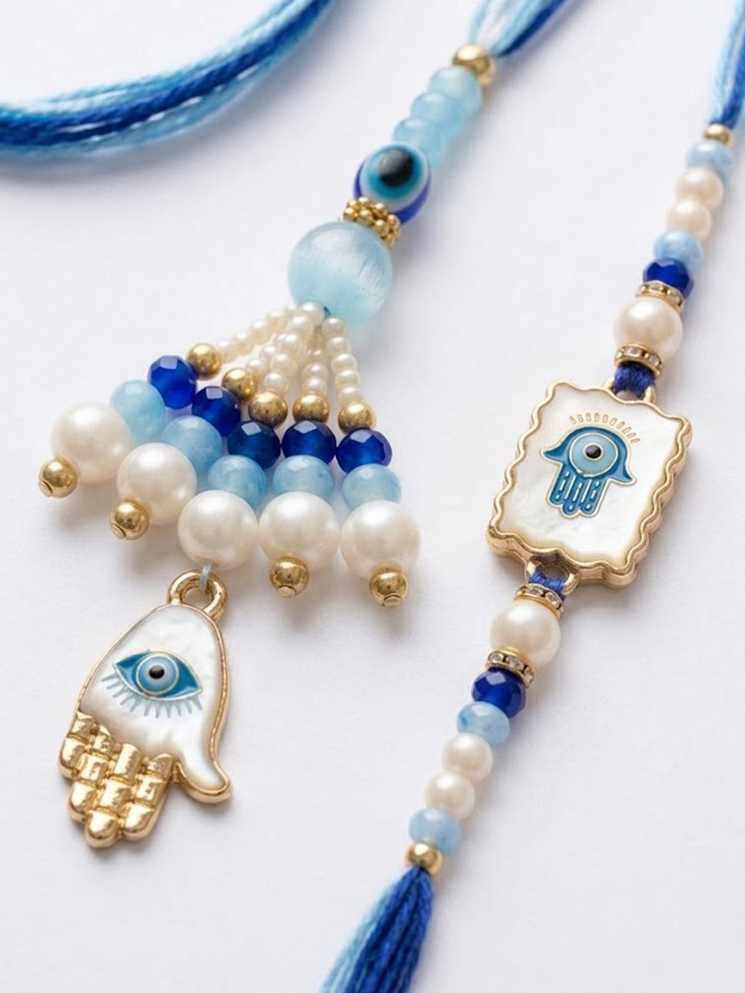 NVR Set of 2 Evil Eye Hand Design Bhaiya Bhabhi Rakhi with Roli Chawal Chandan Mishri