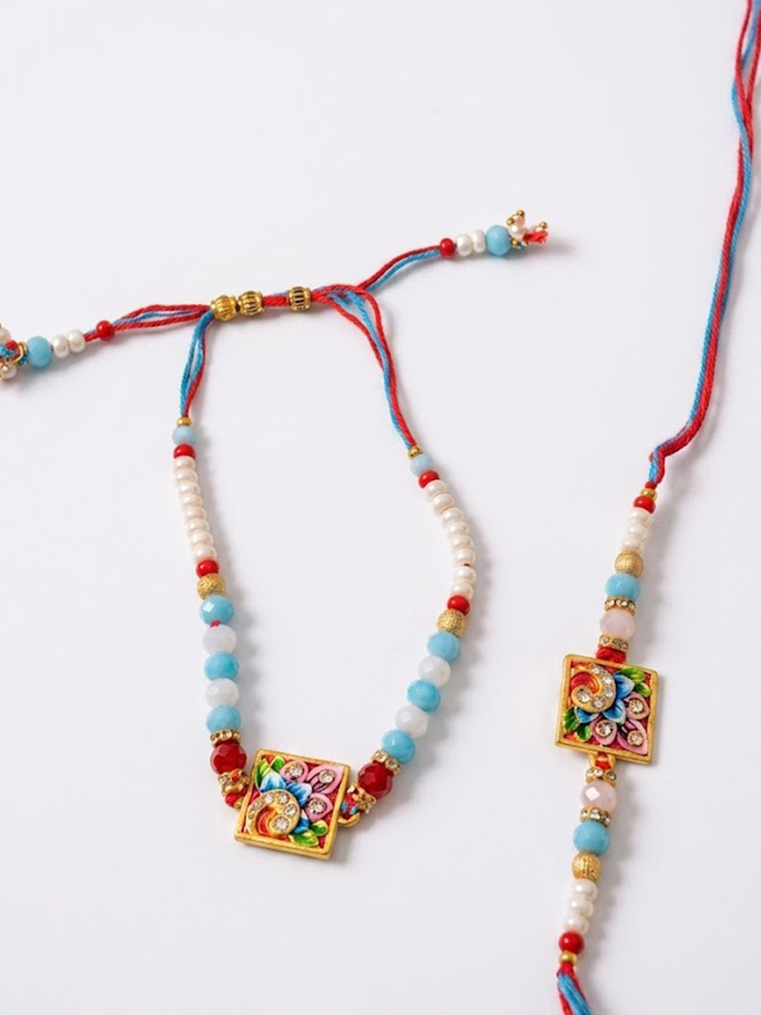NVR Set of 2 Multicolor Artificial Beads Bhaiya Bhabhi Rakhi With Roli Chawal Chandan