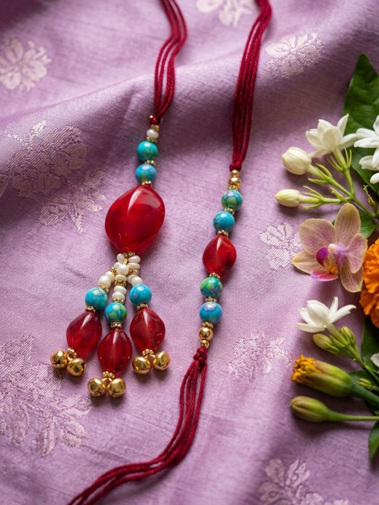 NVR Set of 2 Artificial Beads & Gold Toned Ghungroo Bhaiya Bhabhi Rakhi with Roli Chawal