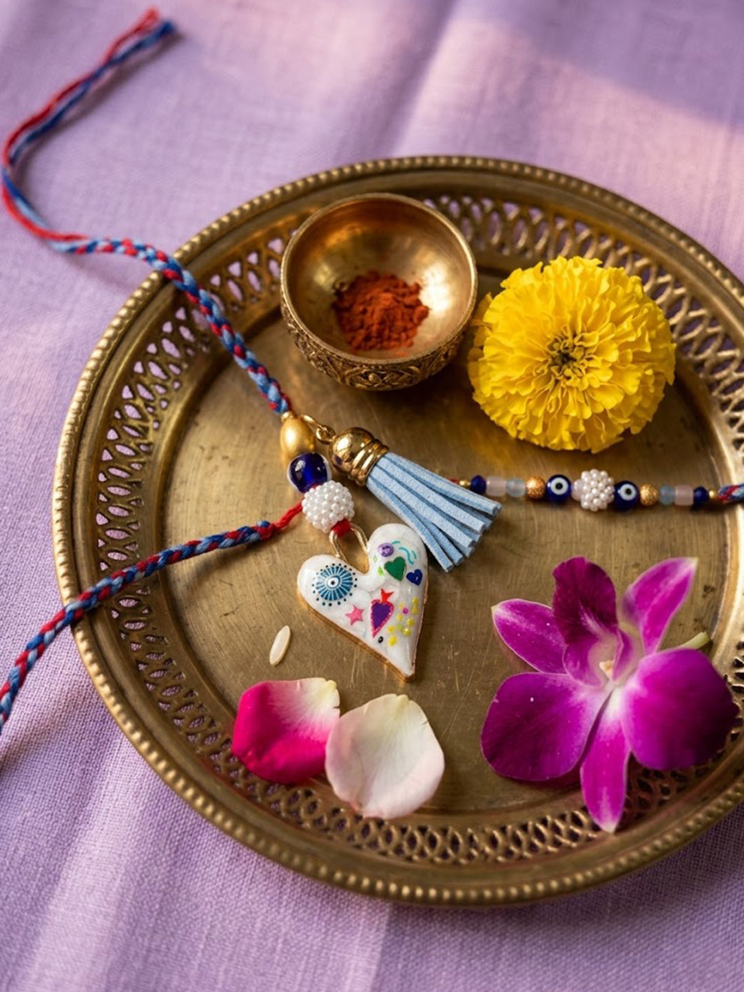 NVR Set of 2 Evil Eye Beaded Heart Shape Bhaiya Bhabhi Rakhi with Roli Chawal Chandan