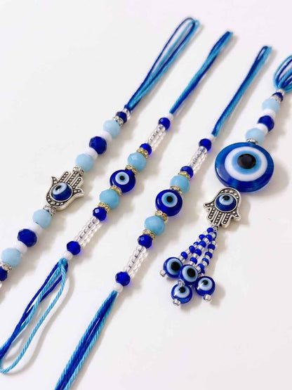 NVR Set of 4 Designer Blue Evil Eye Thread Rakhi with Roli Chawal Chandan Mishri
