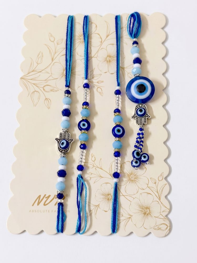 NVR Set of 4 Designer Blue Evil Eye Thread Rakhi with Roli Chawal Chandan Mishri