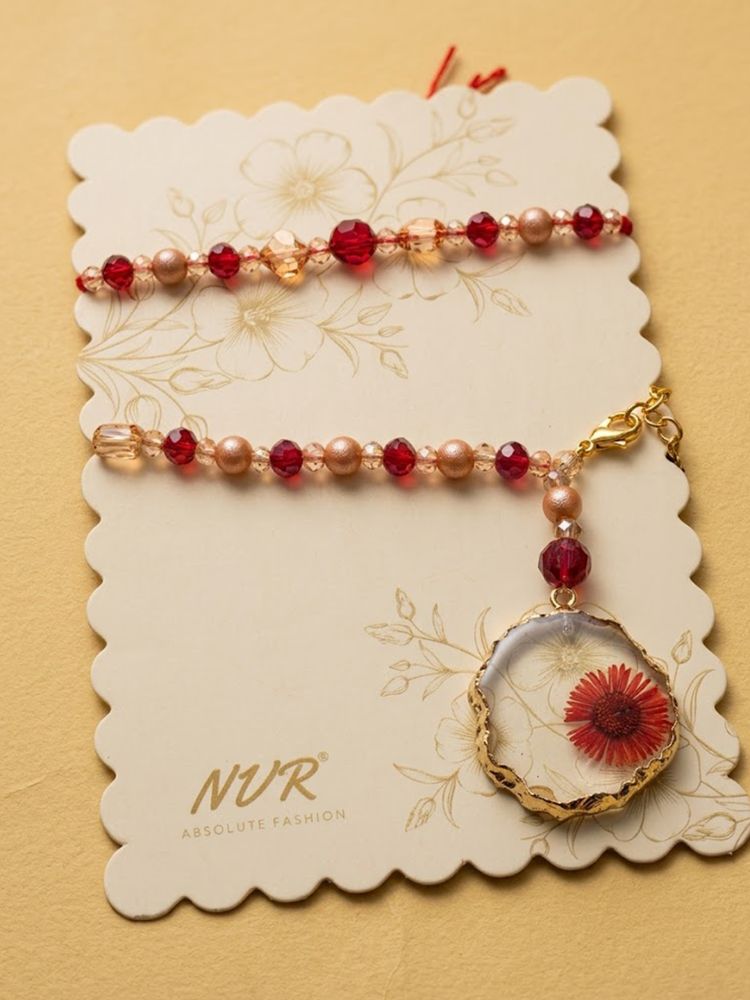 NVR Set of 2 Gold Toned Red Artificial Beads Bhaiya Bhabhi Rakhi With Roli Chawal Chandan