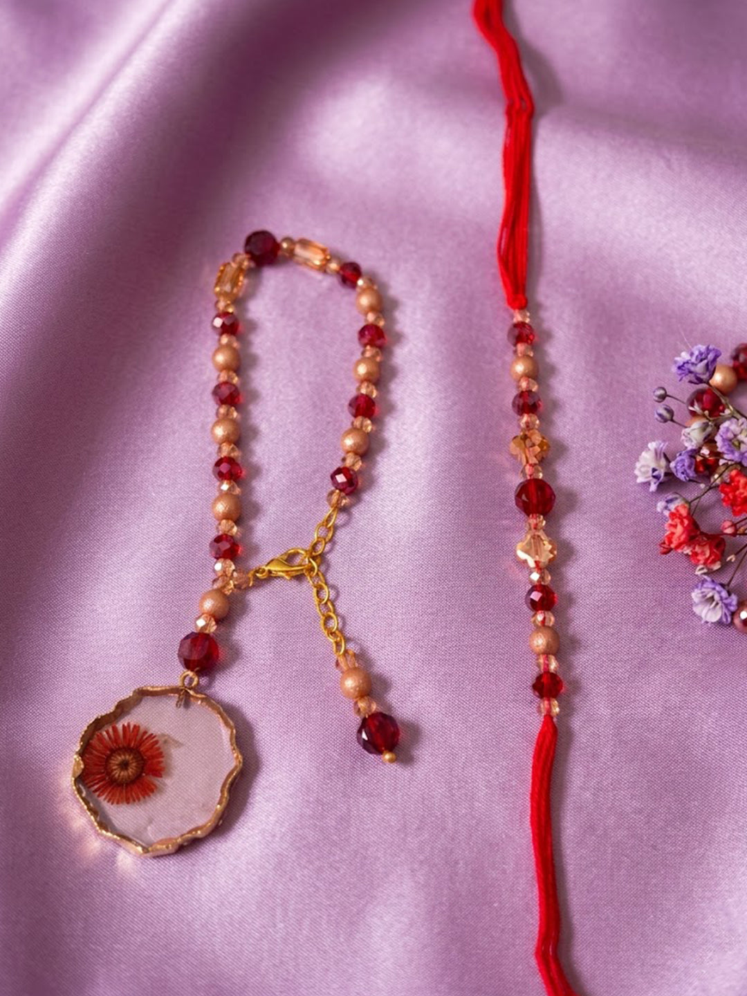NVR Set of 2 Gold Toned Red Artificial Beads Bhaiya Bhabhi Rakhi With Roli Chawal Chandan